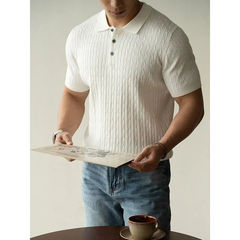 Men's khaki short sleeve business top on a hanger.