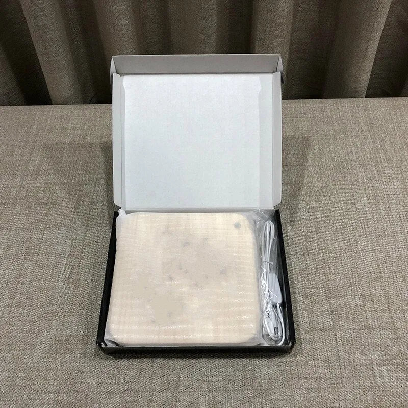 Square wooden USB LED atmosphere light with laser-cut design glowing warm white.