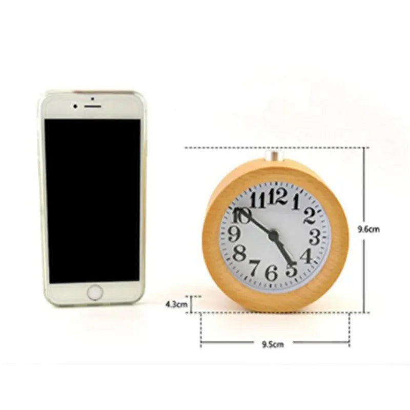 Solid beech wood silent alarm clock with 4-inch diameter display on wooden surface