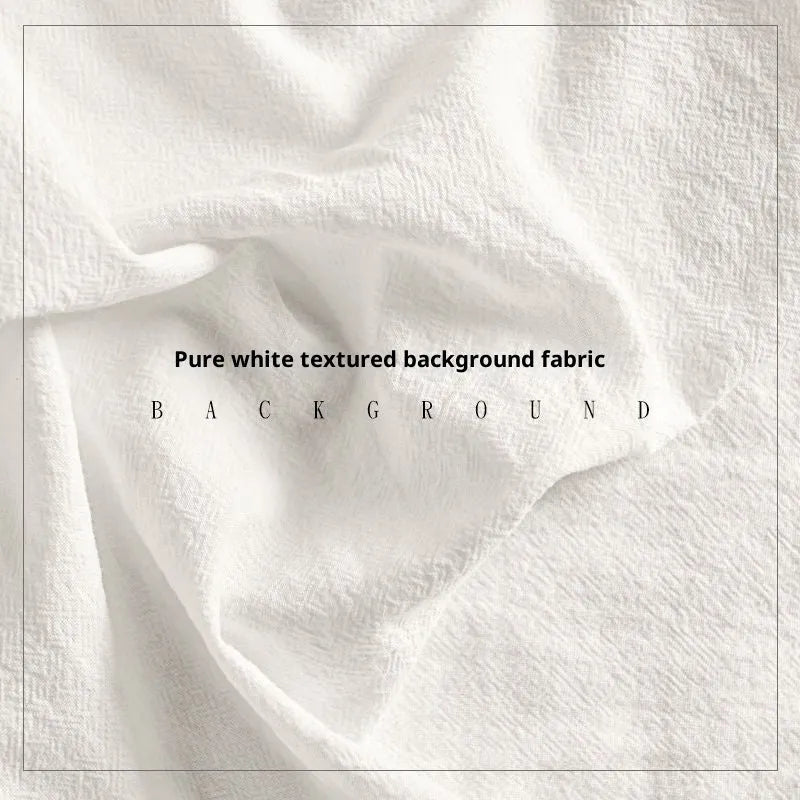 Pure cotton alien-shaped texture props photo tablecloth in beige on a studio backdrop