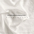 Pure cotton alien-shaped texture props photo tablecloth in beige on a studio backdrop