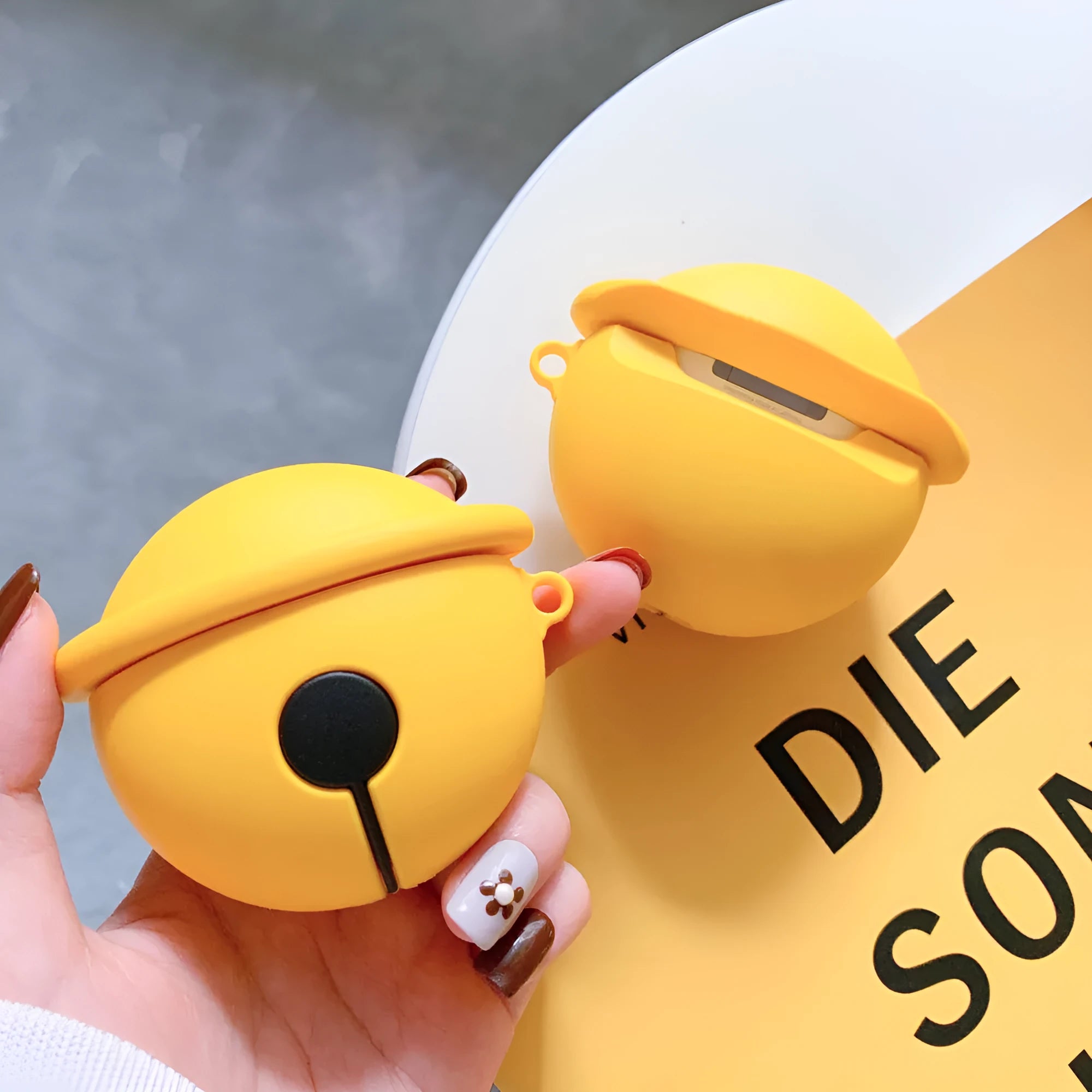 Bright yellow silicone case for AirPods 1 and 2 generation with bell-shaped design