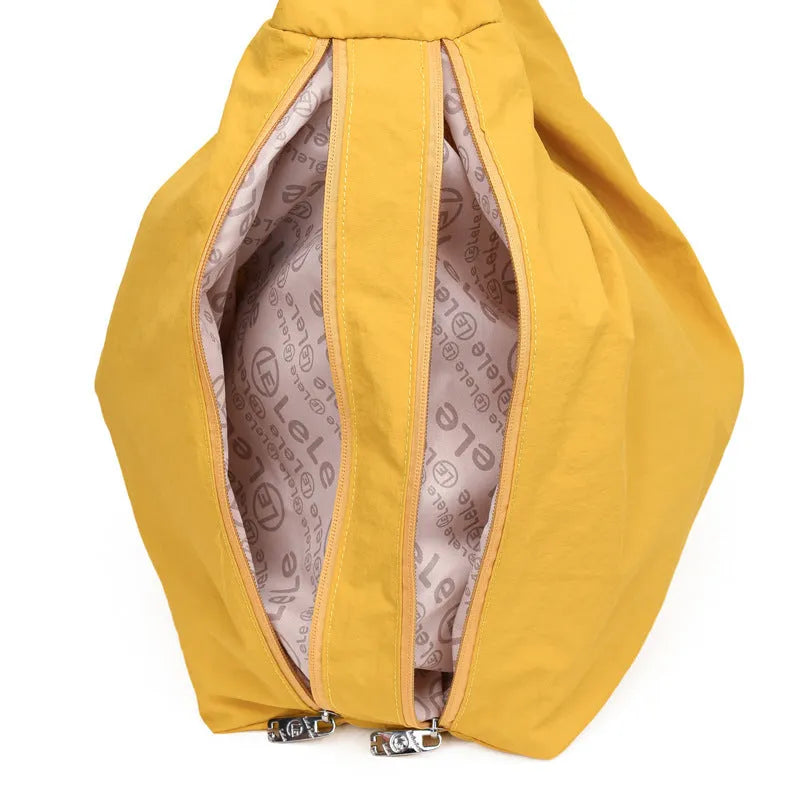 Women's heart-shaped nylon underarm bag in black, yellow, khaki and blue colours with large capacity