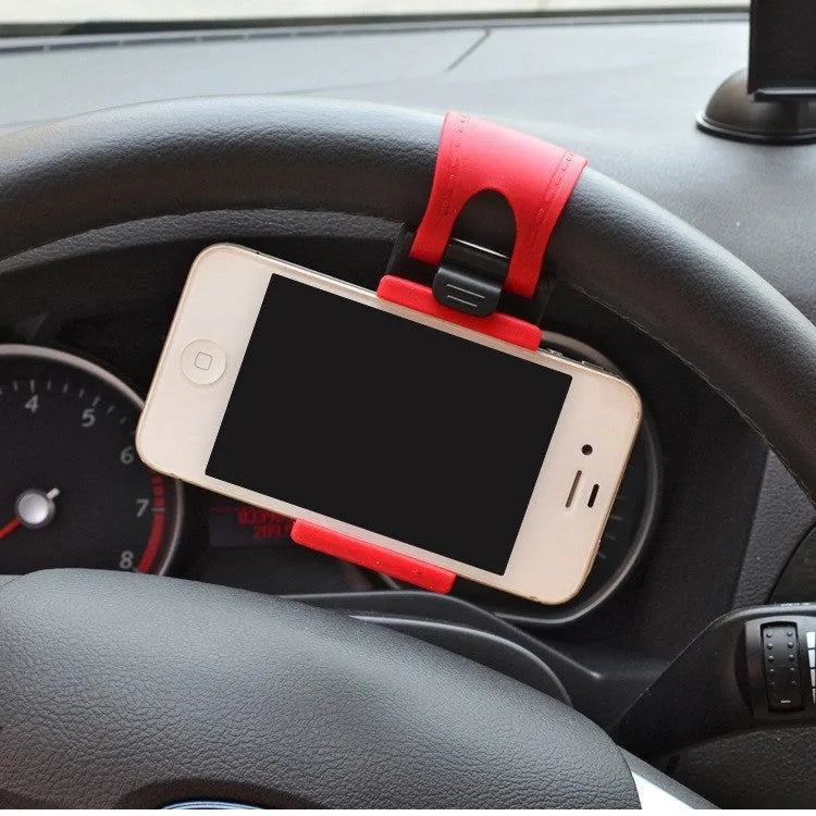 Universal black steering wheel phone mount holder clipped onto a car wheel