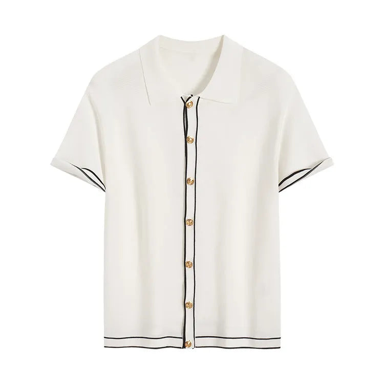 White women's short sleeve cardigan with dark contrast lapels laid flat
