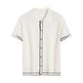 White women's short sleeve cardigan with dark contrast lapels laid flat
