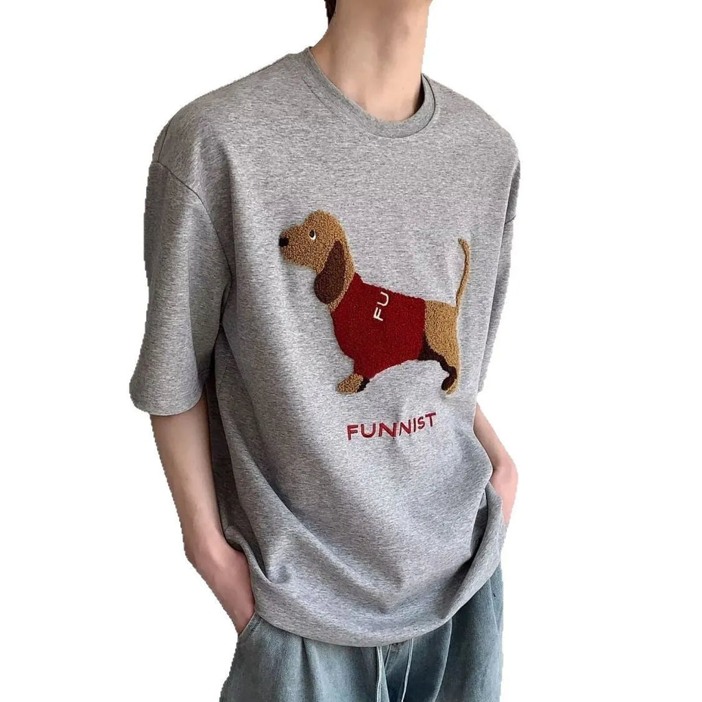 Men's grey cotton t-shirt with embroidered sausage dog holding towel design showing front view