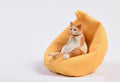 Lazy cat car ornament on sofa, approximately 7.5cm high, made from environmental protection resin with fabric art details