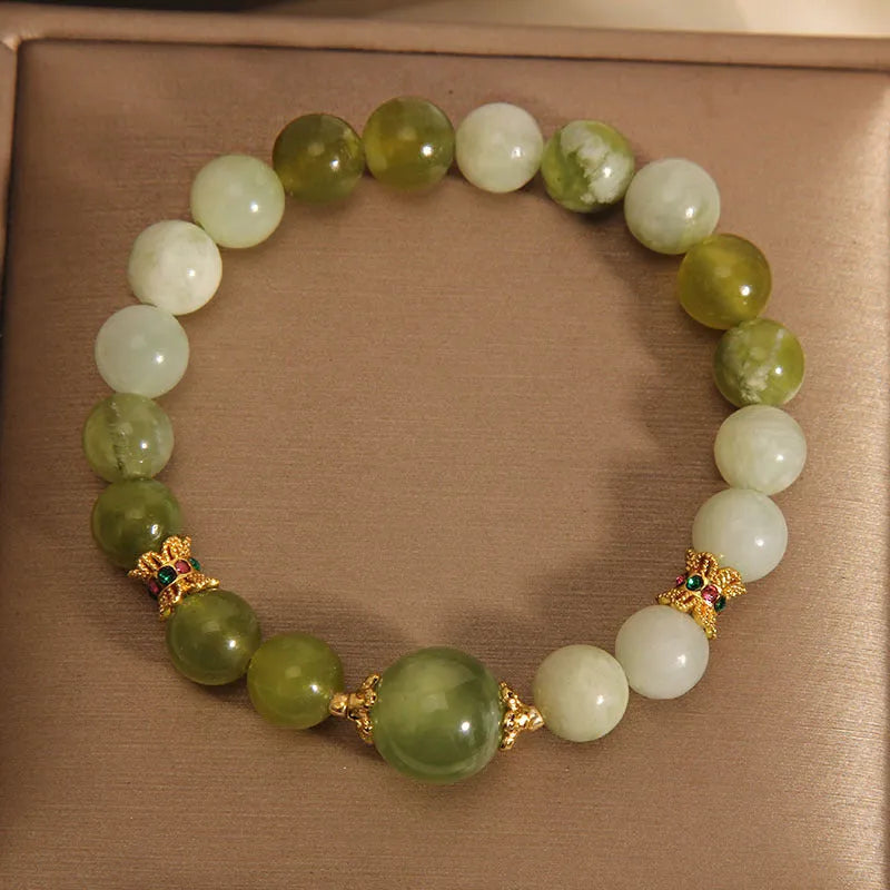 Women's genuine jade bracelet in Xiuyan jade green colour, mori-inspired original design.