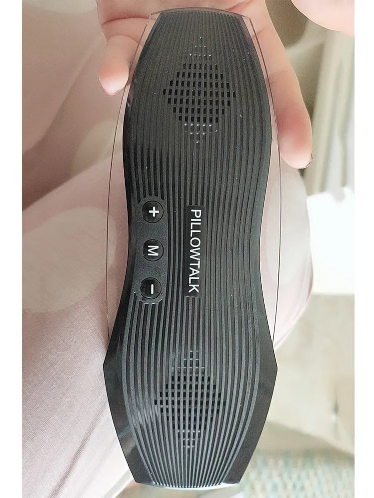 Black true wireless headphones with soft silicone earbuds and compact USB charging case
