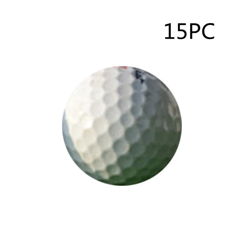 White Golf Next practice game ball with 352 beehive dimples on grass