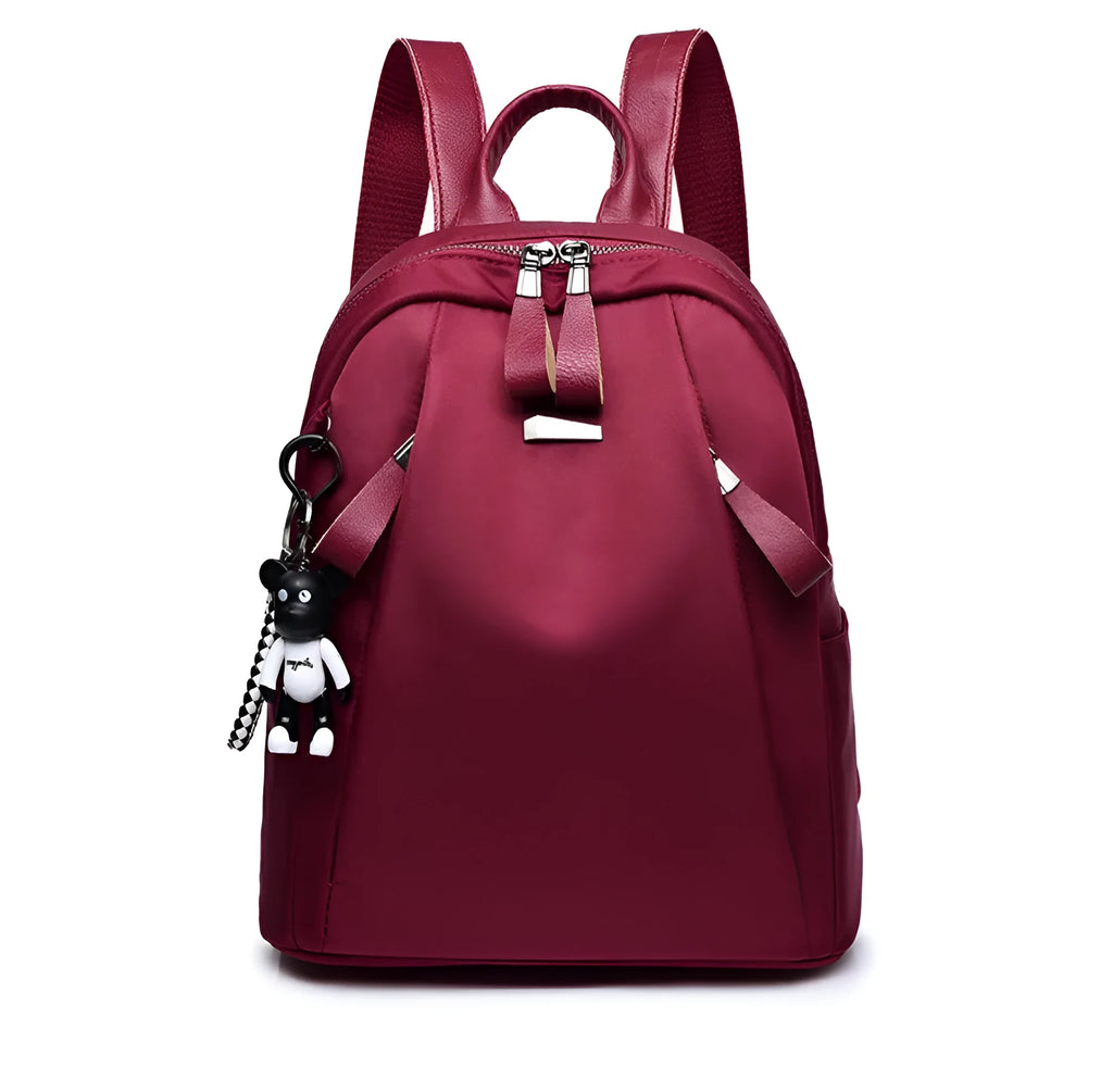 Medium Oxford cloth rucksack in wine red colour showing internal organisation pockets