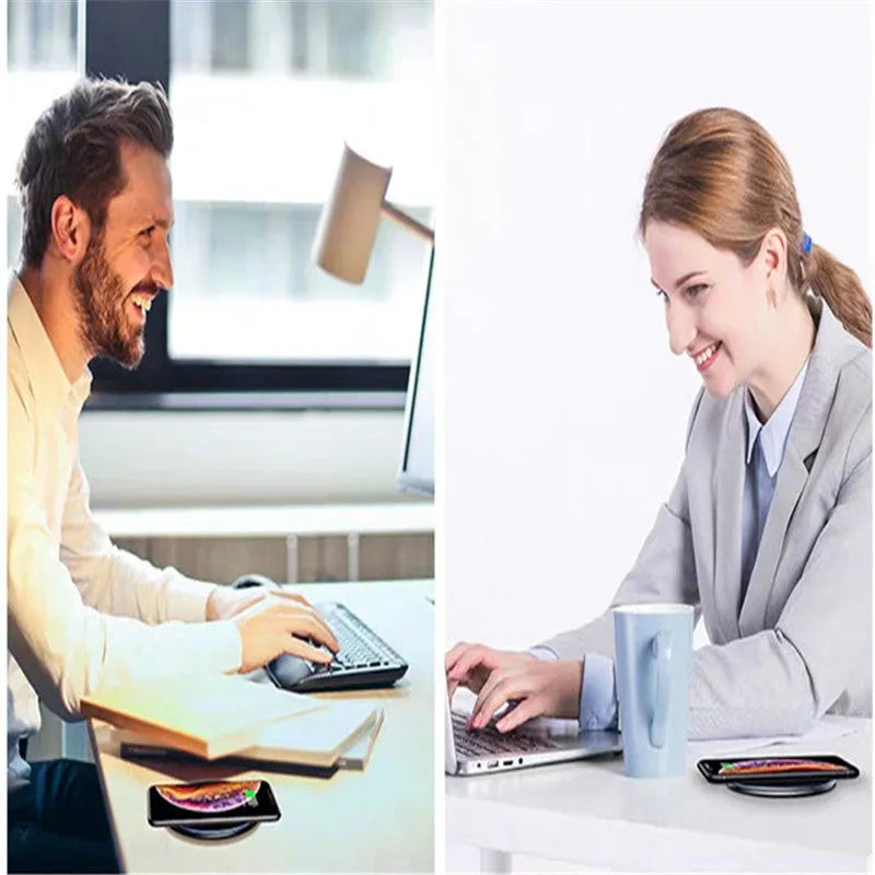 Black aluminium wireless charging pad with LED indicator light on smooth surface