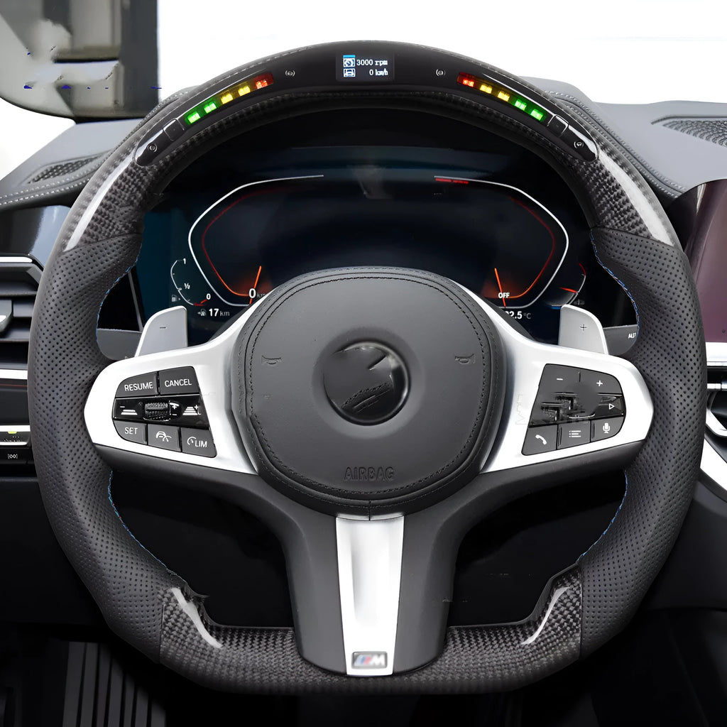 Black carbon fibre BMW steering wheel with LED elements and paddle shifters