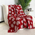 Christmas blanket with snowflake and reindeer patterns in acrylic material