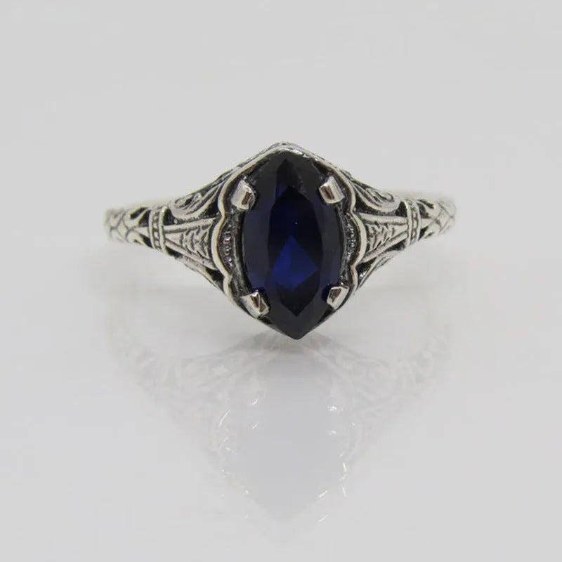 Silver women's ring with geometric hollow pattern and zircon stone on electroplated alloy