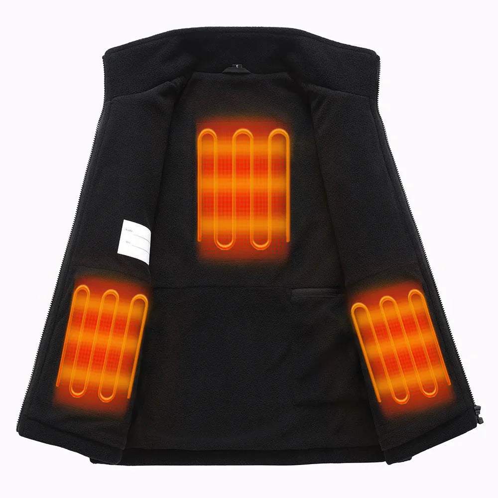 Children's black polar fleece heating jacket with zipper closure on a child