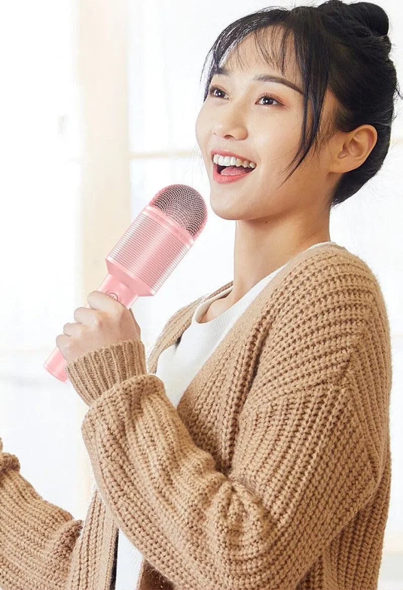 Wireless Bluetooth karaoke microphone in pink, blue, or green colour options