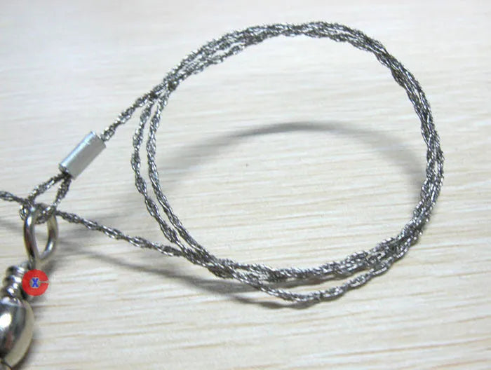 Outdoor survival wire saw with stainless steel blade, pull rings, and hoop showing 55cm cutting length