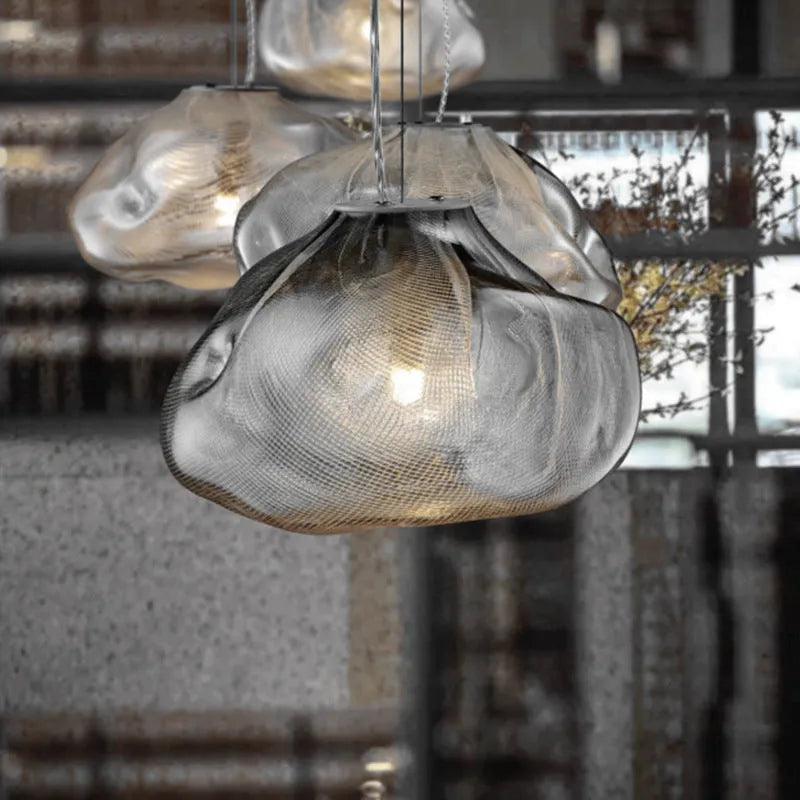 Modern glass decorative chandelier with LED lighting in leisure setting