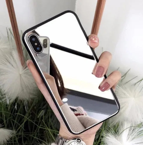 Black clear glass iPhone mirror phone case showing reflective surface and iPhone compatibility