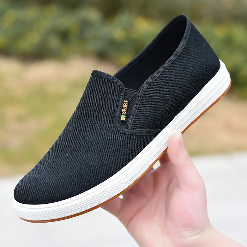 Men's black and blue canvas slip-on shoes with round toe and composite sole