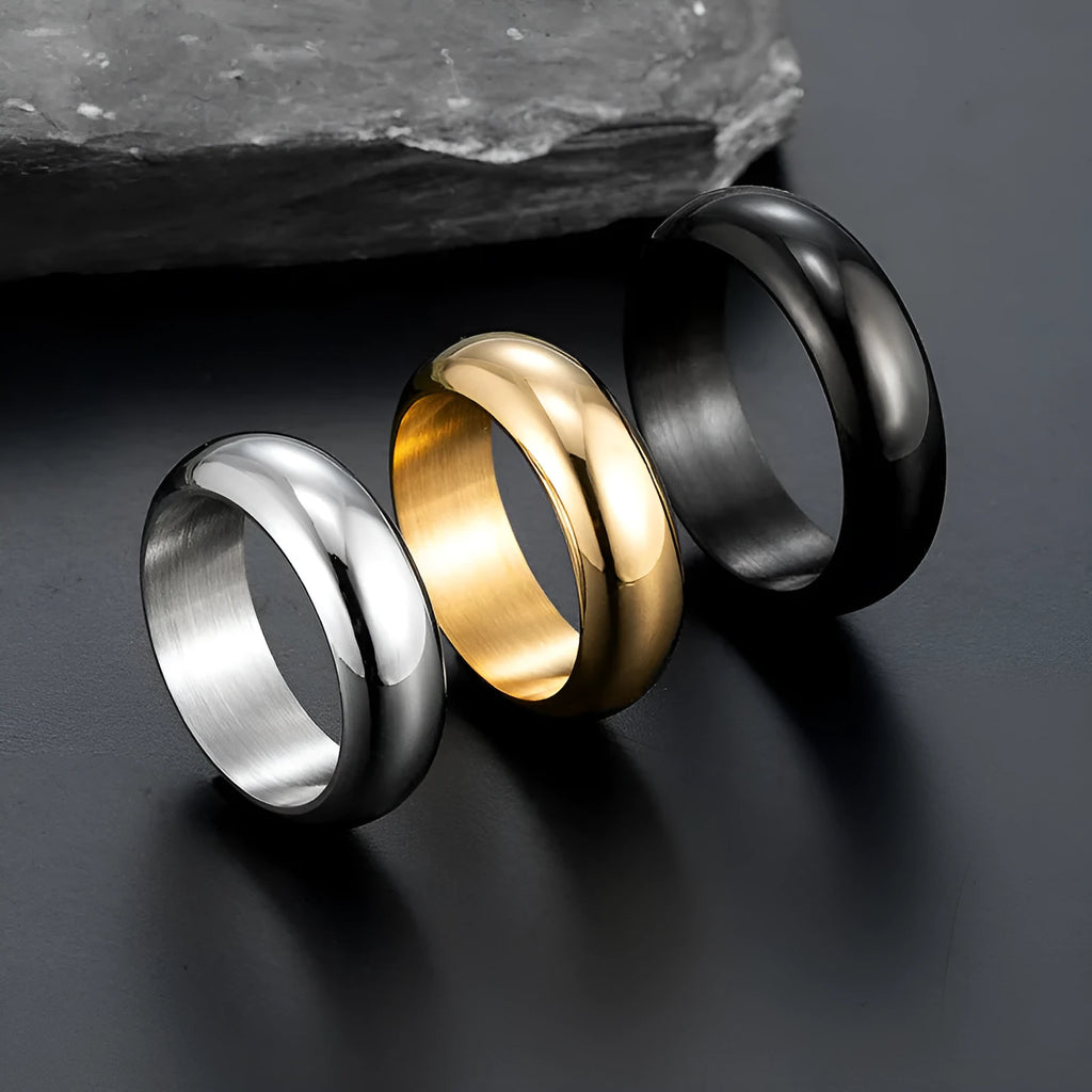 Glossy electroplated titanium steel ring in gold, black, and steel colour options showing polished finish