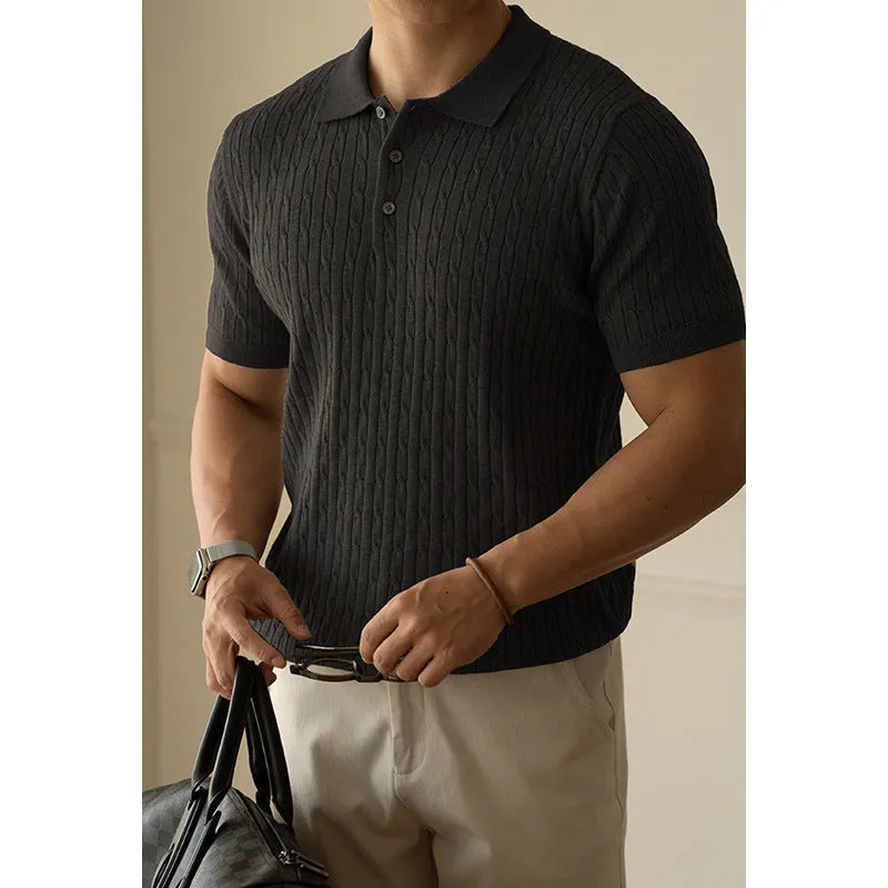 Men's khaki short sleeve business top on a hanger.