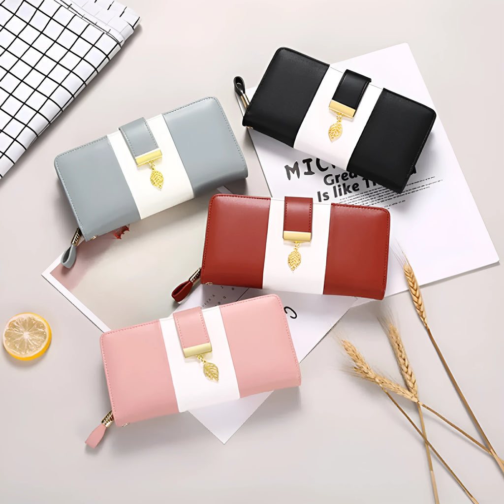 Anti-theft clutch handbag with lock and brush compartment in PU leather, shown in black colour.