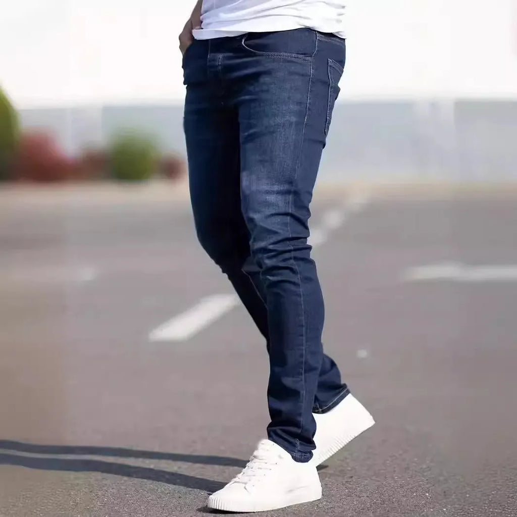 Men's dark blue skinny jeans with medium stretch cotton fabric and zipper fly