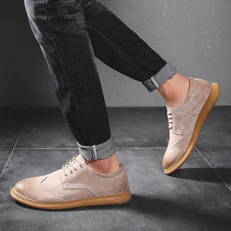 Men's black genuine cowhide leather business lace-up shoes with leather stitching and a rubber sole.