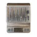 Silver household hexagonal handle screw extractor suit 12 pieces on a wooden surface