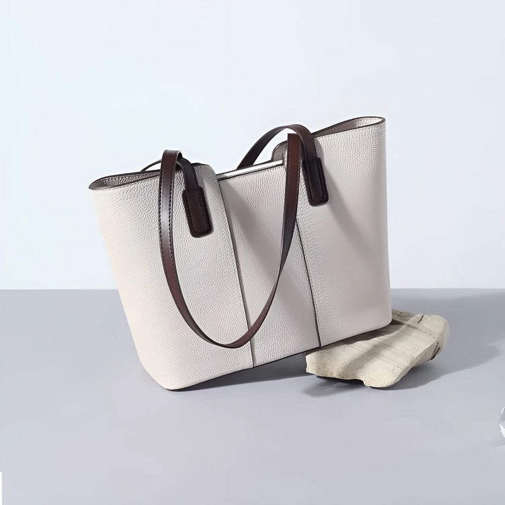 Women's genuine leather commuter shoulder bag in khaki colour showing box-type shape and shoulder strap