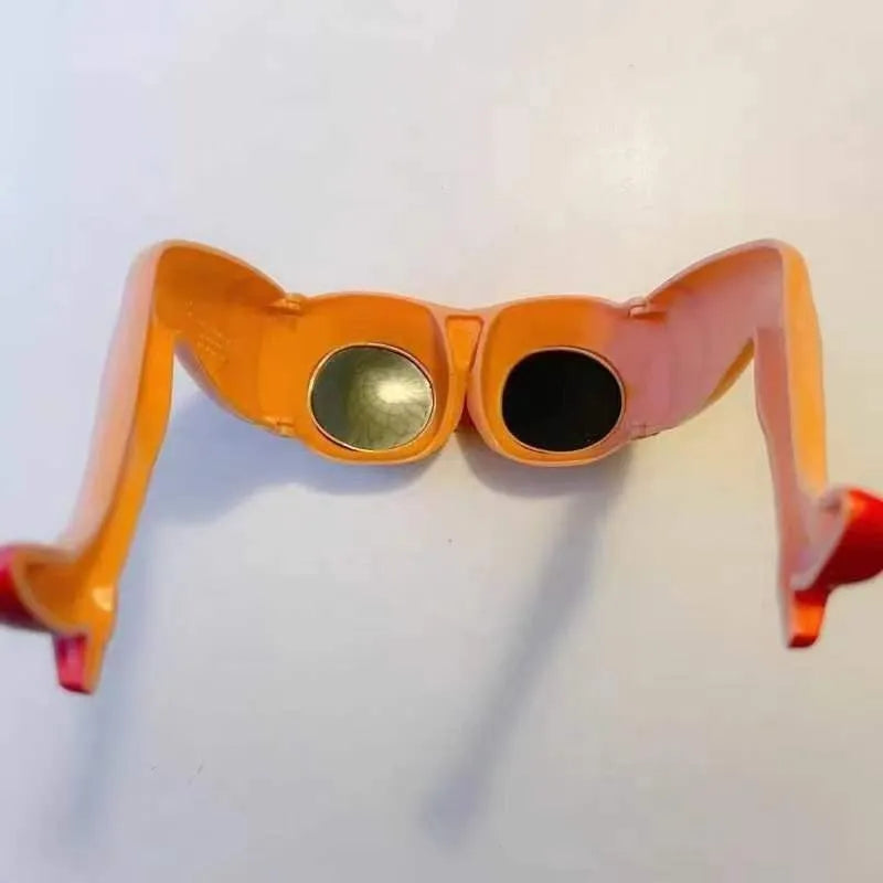 Orange plastic sunglasses with a novel leg and hip personality design on the frame.