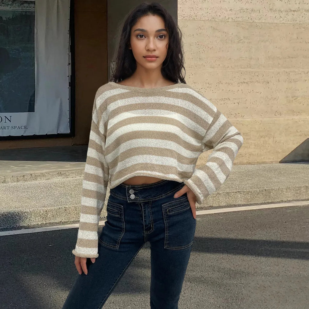 Striped long-sleeved sweater showing front and back wearable design with exposed navel detail