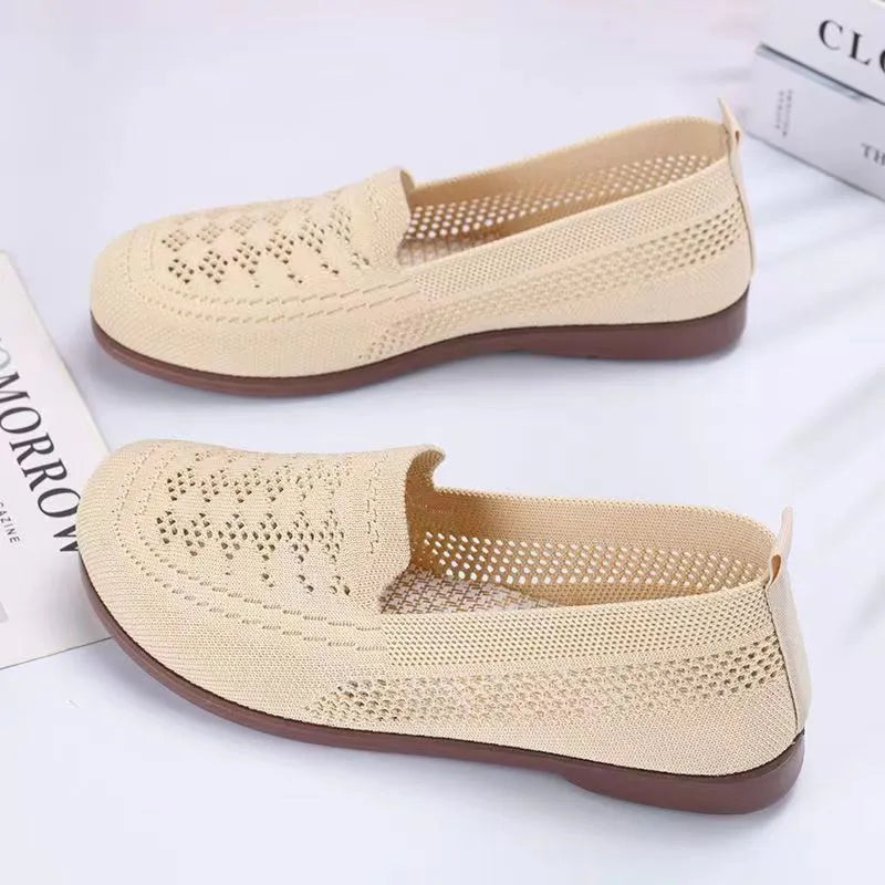 Beige flyknit mesh antiskid trainers for elderly women with wide fit and breathable hollow-out design