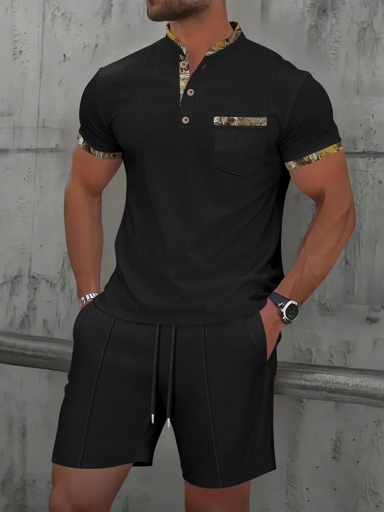 Men's grey zip-front polo collar short sleeve top paired with matching shorts, a casual summer suit set.