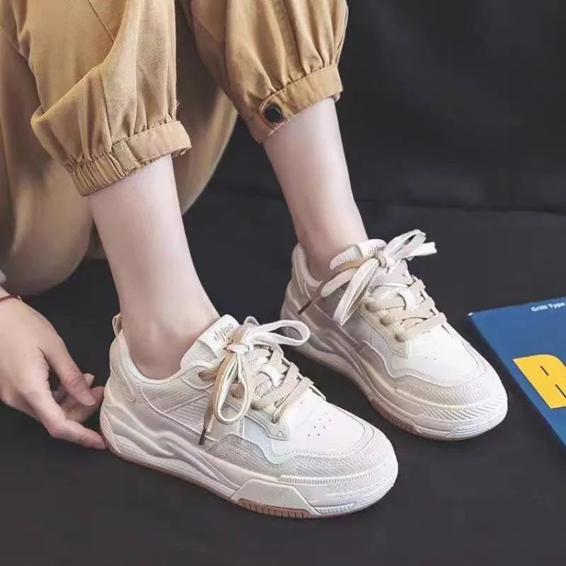Low top sneakers with rubber sole in pink, milky white, and beige colours