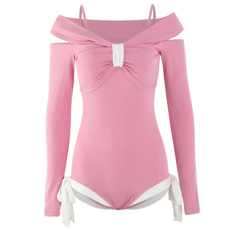 Women's long-sleeve one-piece swimsuit in polyester fabric available in pink or black colours