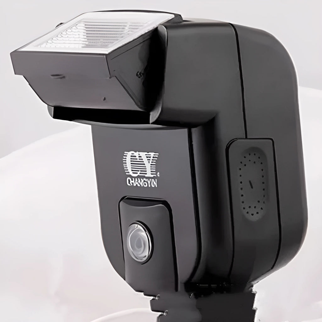 SLR camera flash unit with adjustable tilt head mounted on camera hot shoe