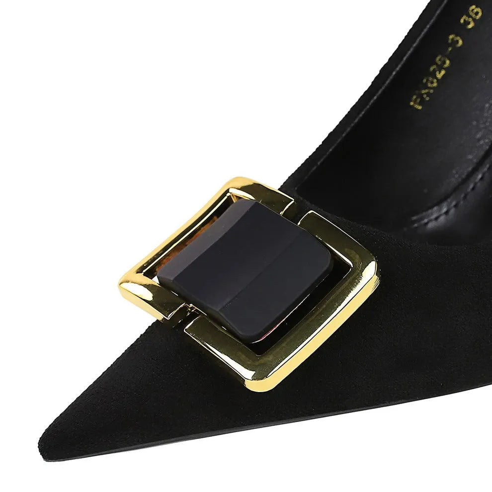 Black suede women's stiletto high heels with a pointed toe and 9cm heel on a white background.