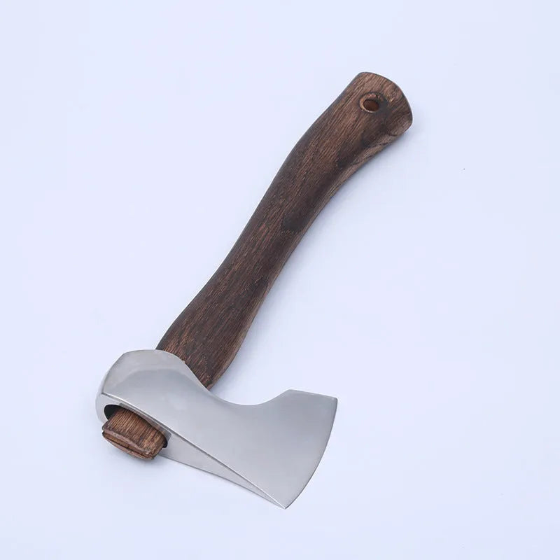 Camping axe with high carbon steel head and wooden handle on solid background