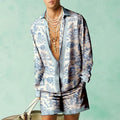 Men's casual summer outfit featuring a slim-fit long sleeve shirt and matching shorts in light blue.