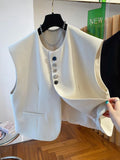 Beige loose-fitting short bandage waistcoat dress with pockets on a mannequin