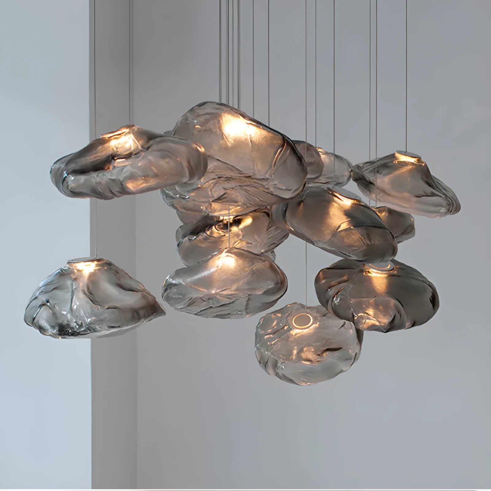Modern glass decorative chandelier with LED lighting in leisure setting