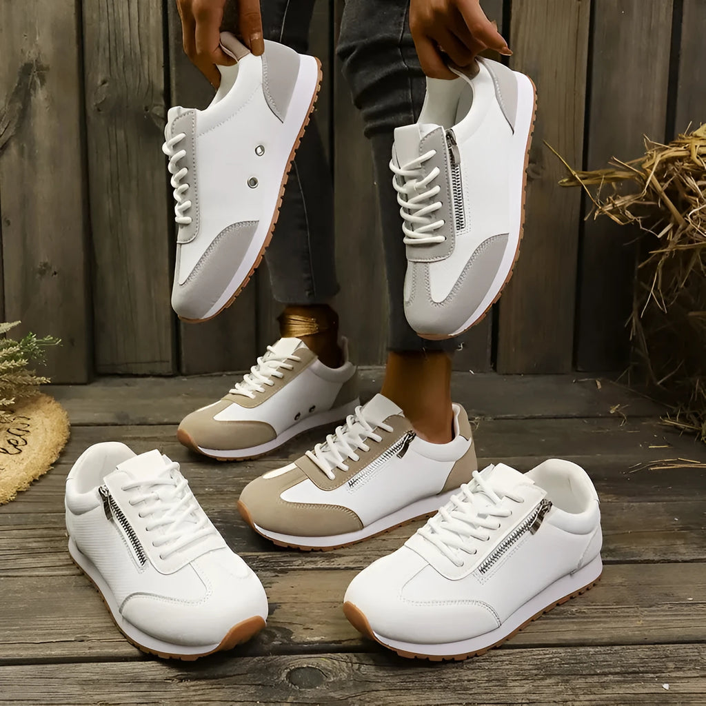Women's flat-heeled shoes in artificial PU leather with rubber soles showing neutral colour options