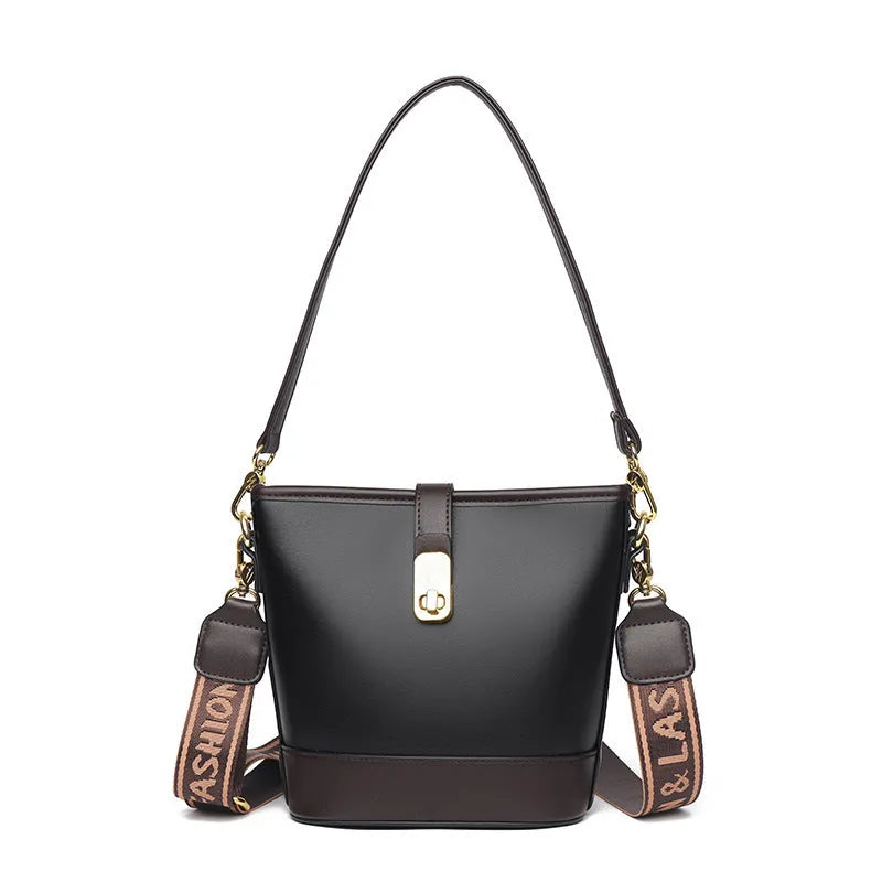 Korean style black bucket bag with dual shoulder straps and multiple internal zippered compartments