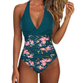 Women's printed one-piece bikini swimsuit with lace-up detail and backless gathered design in floral pattern.