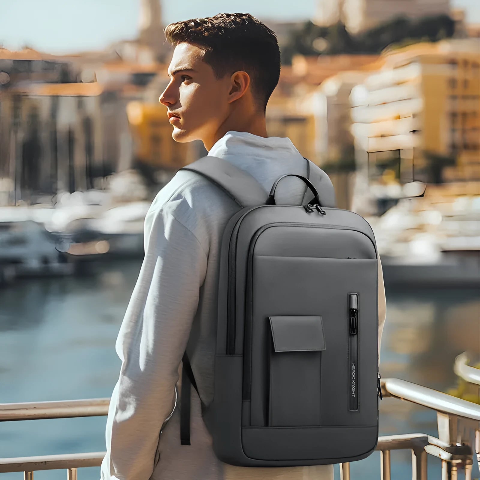 Men's lightweight Oxford cloth backpack in solid colour with sewing line detail