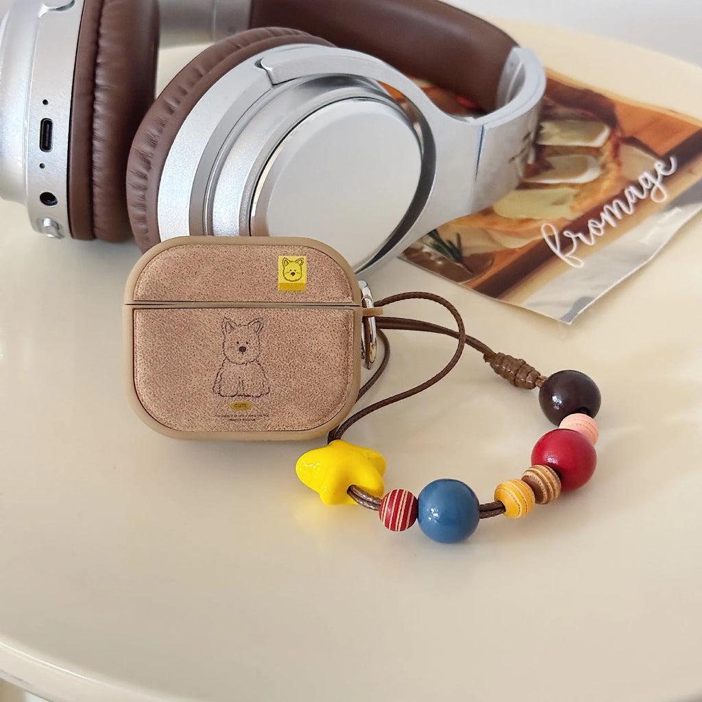 Brown dog magnetic TPU earphone sleeves for AirPods cases showing all-in-one design with lanyard clip